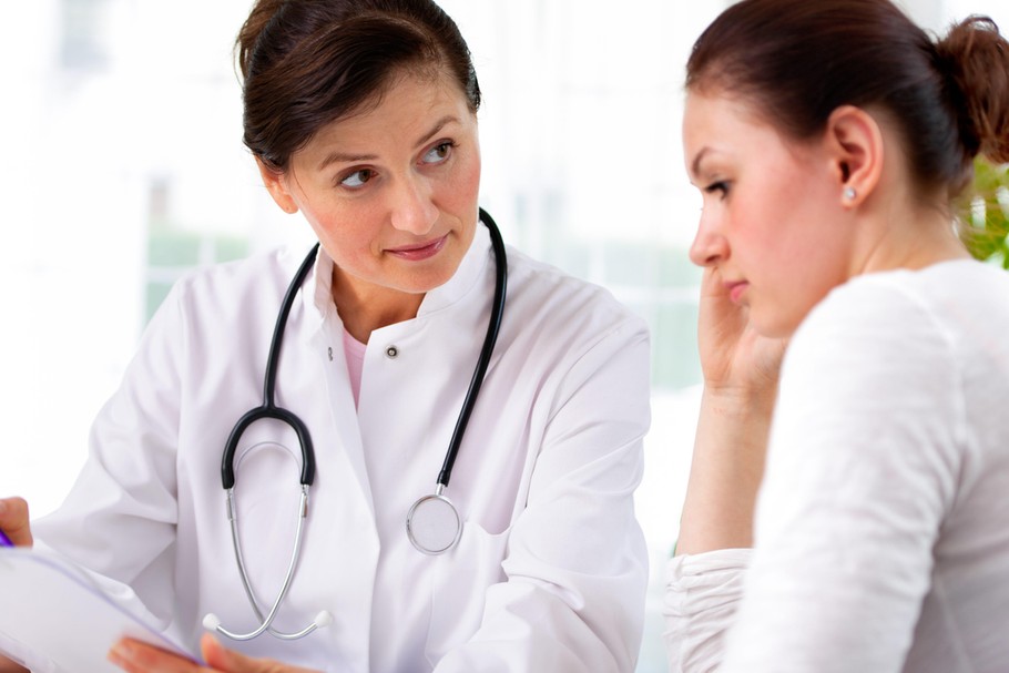 doctor with female patient