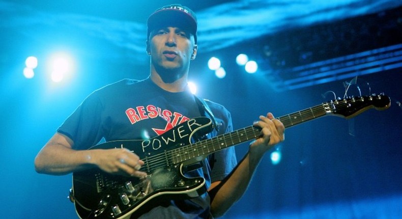 Tom Morello, pictured performing in 2005, will reunite with Audioslave bandmates to perform at the Anti-Inaugural Ball