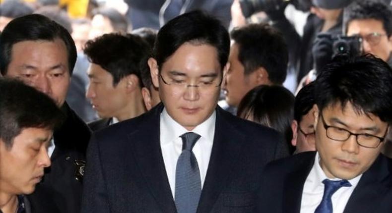 Lee Jae-Yong (C), Samsung Electronics vice chairman and the son of Samsung group chairman Lee Kun-Hee, arrives at the court for a hearing to review the issuing of his arrest warrant at the Seoul Central District Court in Seoul on February 16, 2017