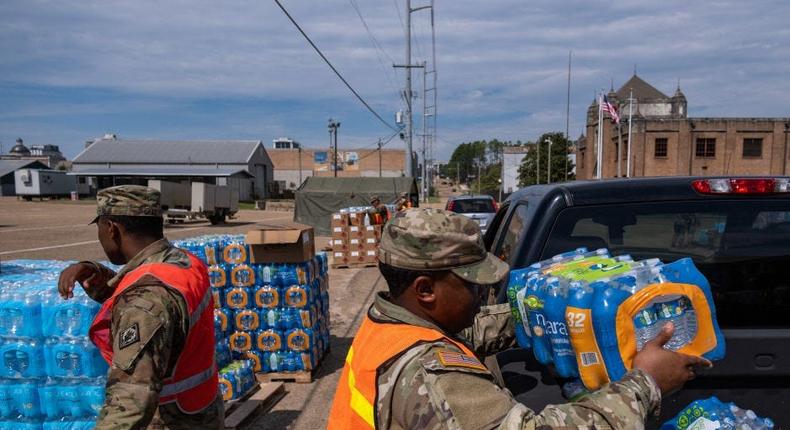 The National Guard is distributing bottled water at sites across Jackson, Mississippi. The city's population is 80 percent Black and gone without clean drinking water for more than a month.