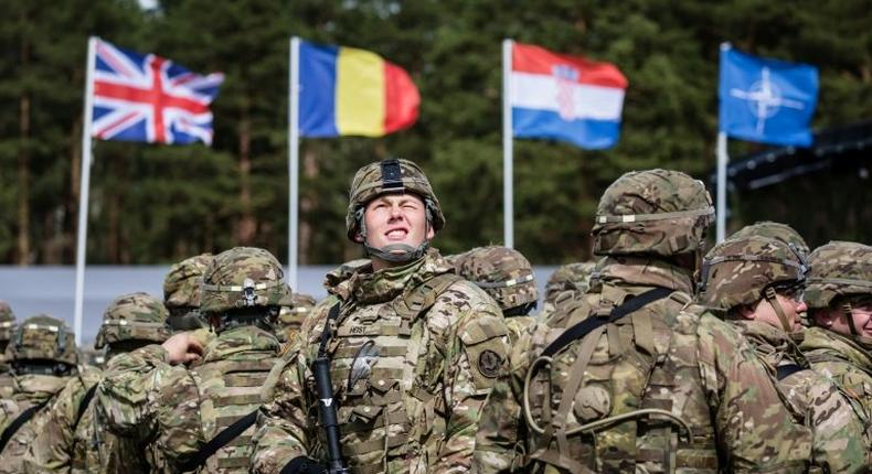 US soldiers are pictured prior the beginning of the official welcoming ceremony of NATO troops in Orzysz, Poland, on April 13, 2017