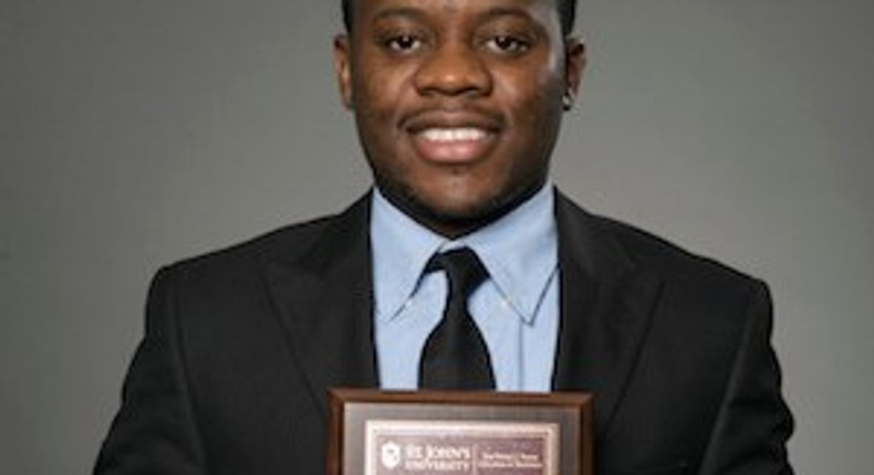 Adolph Okine, Ph.D. Student in Actuarial Science, Risk Management, and Insurance, holds his recent Best Paper Award.