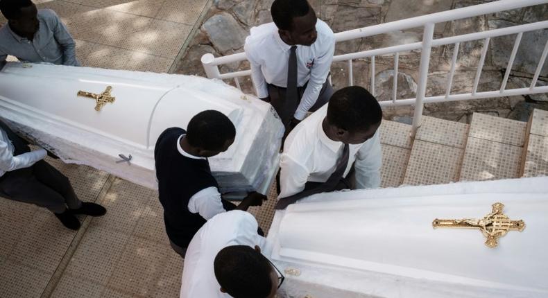 Eighty-one white coffins containing the remains of 84,437 victims of the 1994 mass killings were buried at the Nyanza Genocide Memorial in Kigali