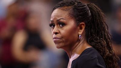 Michelle Obama has remained relatively quiet about President Biden's reelection bid, with sources pointing to private frustration as a potential reason why.Jean Catuffe, Getty