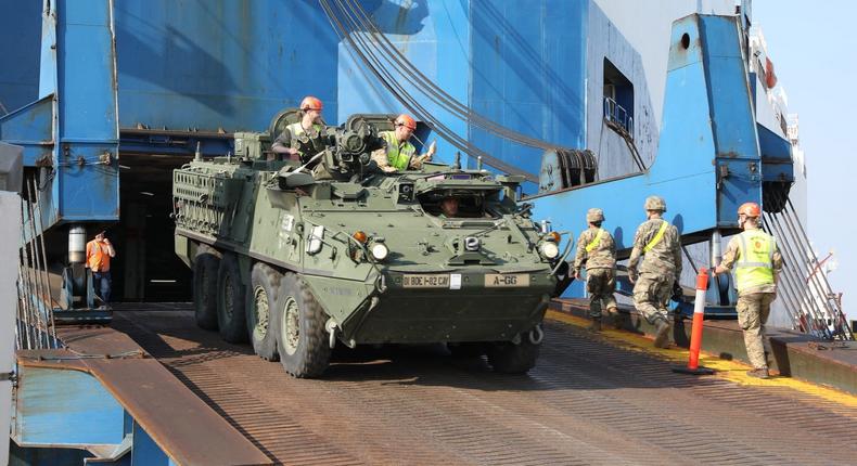 US Army logisticians and transporters offload equipment at the port in Esbjerg, Denmark, June 5, 2021.
