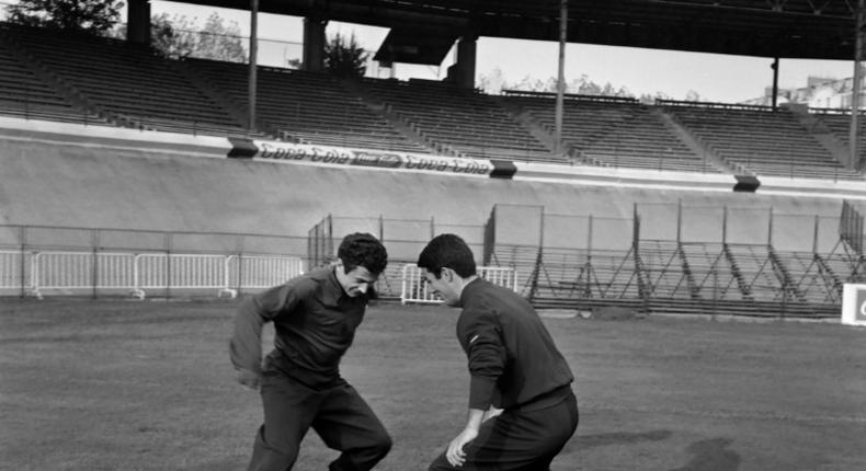 Dragoslav Sekularac testing his dribbling skill against Yugoslav teammate Milan Galic in 1965