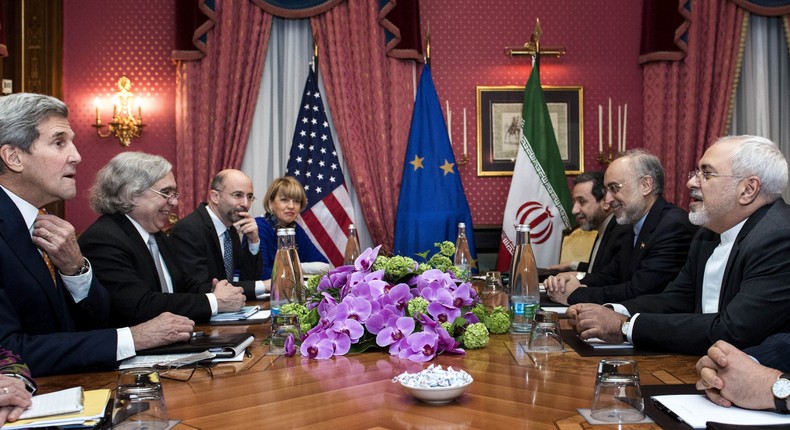 U.S. Secretary of State John Kerry (L), U.S. Secretary of Energy Ernest Moniz (2nd L), Head of the Iranian Atomic Energy Organisation Ali Akbar Salehi (2nd R) and Iranian Foreign Minister Javad Zarif (R) wait with others ahead of a meeting  on March 26, 2015.