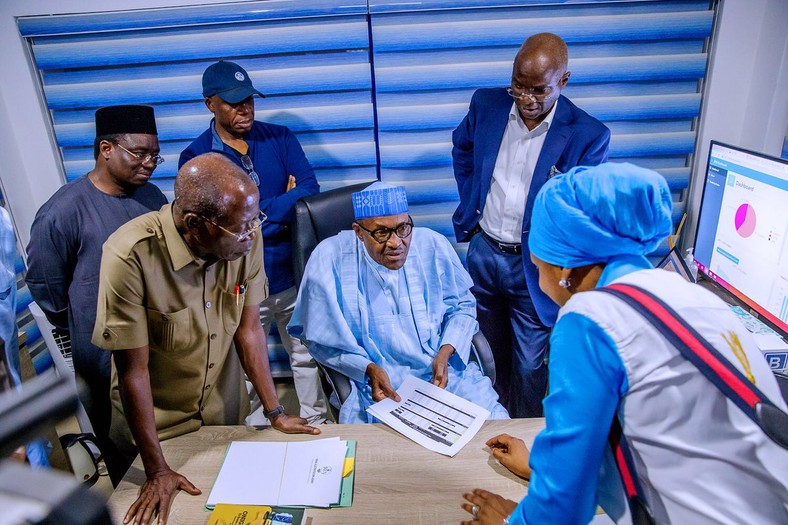 President Buhari pays surprise visit to the APC Situation Room during the just ended presidential election (APC media) 