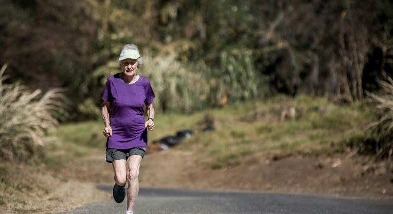 Deirdre Larkin, 85, holder of the half marathon world record for her age, each morning runs an 8-kilometre (5-mile) training course close to her home in a Johannesburg suburb