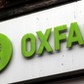 A sign is seen above a branch of Oxfam, in central London