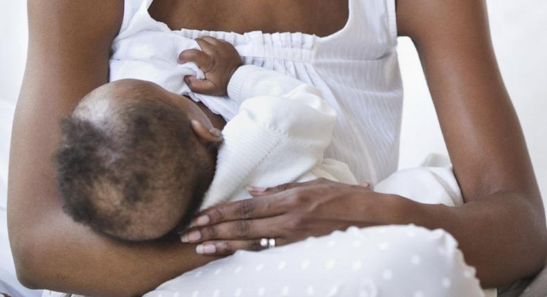 A Nigerian mum breastfeeding her baby
