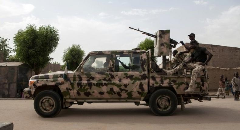 A Nigerian army vehicle patrols in the town of Banki in northeastern Nigeria on April 26, 2017