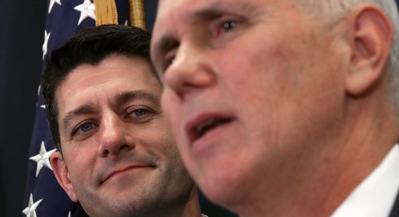 Speaker of the House Paul Ryan (L) and Vice President-elect Mike Pence