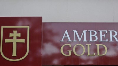 Logo Amber Gold bordowe