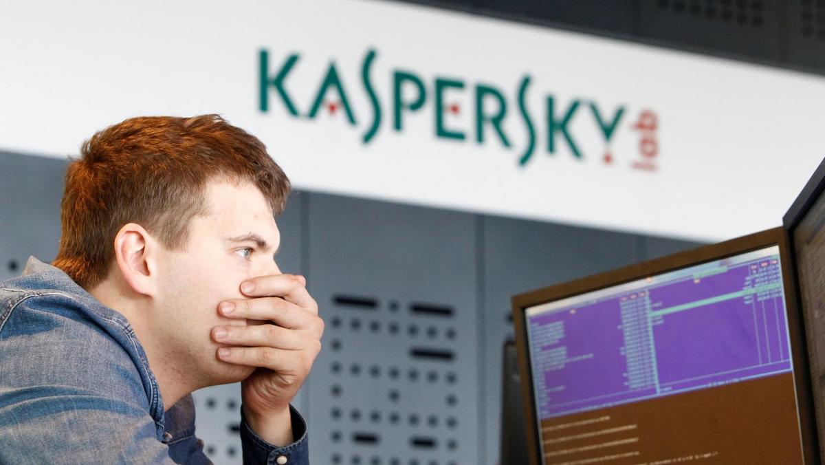 FILE PHOTO: An employee works near screens in the virus lab at the headquarters of Russian cyber security company Kaspersky Labs in Moscow