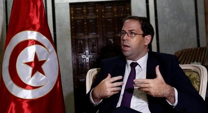 Tunisia's Prime Minister Youssef Chahed talks during an interview with Reuters in Tunis, Tunisia, September 29, 2016. 