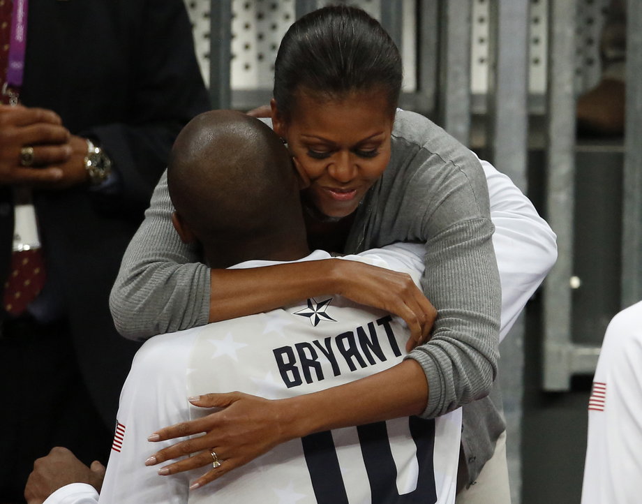 First Lady Michelle Obama hugs Bryant at the end of the men's preliminary round match at the London 2012 Olympic Games. The National Team would go on to win the Olympic Basketball Finals, once again defeating Spain.