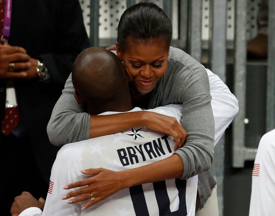 First Lady Michelle Obama hugs Bryant at the end of the men's preliminary round match at the London 2012 Olympic Games. The National Team would go on to win the Olympic Basketball Finals, once again defeating Spain.