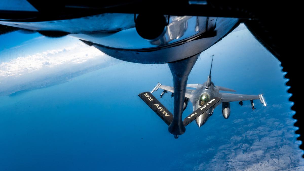 July 28, 2022, Adriatic Sea, Italy: A U.S. Air Force F-16 Fighting Falcon fighter jet, assigned to the 31st Fighter Wing, approaches a KC-135 Stratotanker