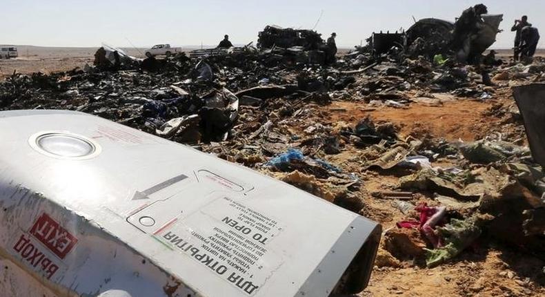 The remains of a Russian airliner are inspected by military investigators at the crashÂ site at the al-Hasanah area in El Arish city, north Egypt, November 1, 2015.  REUTERS/Mohamed Abd El Ghany