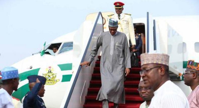 President Muhammadu Buhari arriving Abuja from Qatar on Monday, February 29.