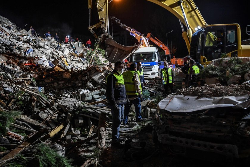 Rescue operations take place on a site after an earthquake struck the Aegean Sea, in the coastal pro