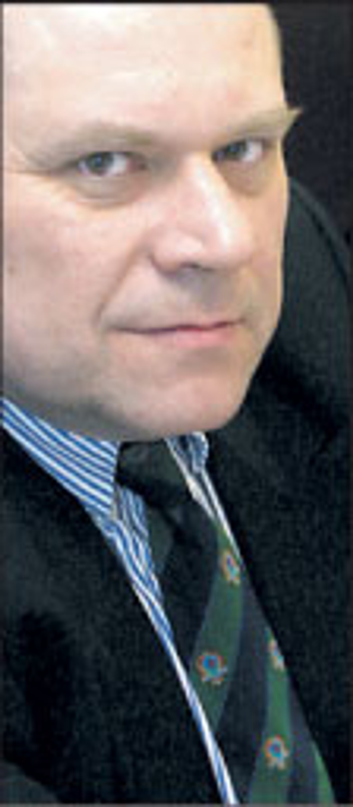 dr Janusz Fiszer, partner White & Case, docent UW