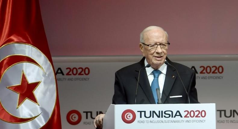 Tunisian President Beji Caid Essebsi gives a speech during the opening ceremony of the Tunisia 2020 international investment conference on November 29, 2016 in Tunis