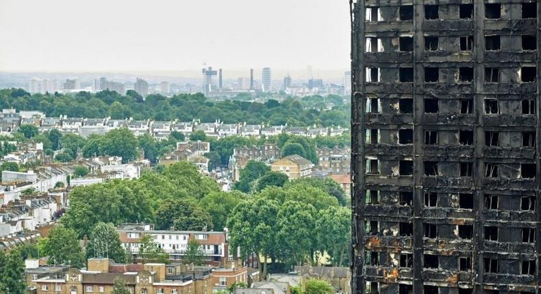 The charred remains of clading on the outer walls of the burnt out shell of the Grenfell Tower block in London have prompted urgent tests in other towers for possible fire risk