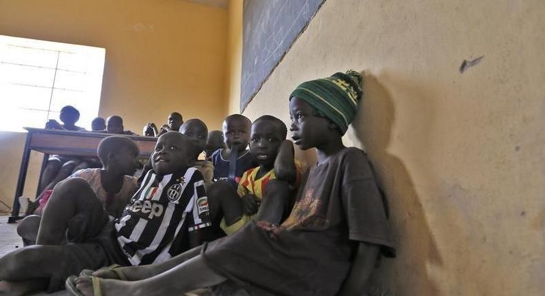 Children displaced as a result of Boko Haram attack in the northeast region of Nigeria, attend a class at Maikohi secondary school camp for internally displaced persons (IDP) in Yola, Adamawa State January 13, 2015. 