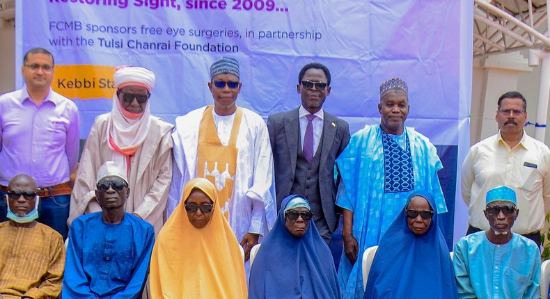 Standing from left: Ophthalmic Surgeon, Tulsi Chanrai Foundation (TCF), Dr. Mahesh Rao Khande; Galadima of Gwandu Kingdom in Kebbi State, Alhaji Ibrahim Bashar; Commissioner for Health, Comrade Yunusa Ismail; Head of Corporate Social Responsibility at First City Monument Bank, Mr. Omoniyi Iyanda; Special Adviser on Media to the Deputy Governor of Kebbi State, Alhaji Ibrahim Argungu; and Programme Manager of TCF, Mr. Chandrakant Deshpande, with some of the beneficiaries during the outreach programme commemorating the 15th anniversary of FCMB’s Priceless Gift of Sight held recently in Birnin-Kebbi, Kebbi State.