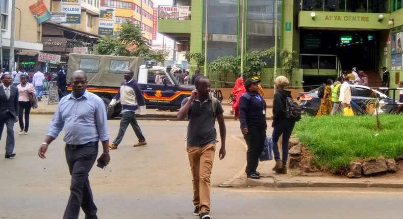 Police land rover at Afya Centre keeping away matatus from entering the CBD