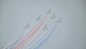 The smog made maneuvers by China's aerobatics teams unusually difficult to see, as the country seeks to shed its cities' reputation for pollution.HECTOR RETAMAL/AFP via Getty Images