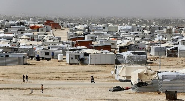 Syrian refugees are seen at the Al Zaatari refugee camp in the Jordanian city of Mafraq, near the border with Syria March 11, 2015. REUTERS/Muhammad Hamed