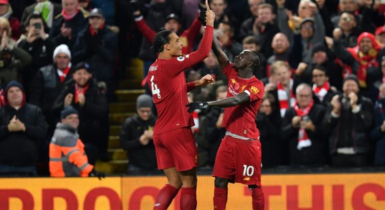 Senegalese Sadio Mane (R) celebrates with Virgil van Dijk after scoring for Liverpool against Manchester City last weekend