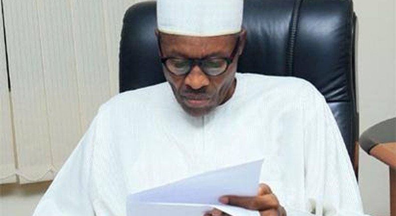 ___5506109___https:______static.pulse.com.gh___webservice___escenic___binary___5506109___2016___9___19___10___buhari-reading-jide-salu