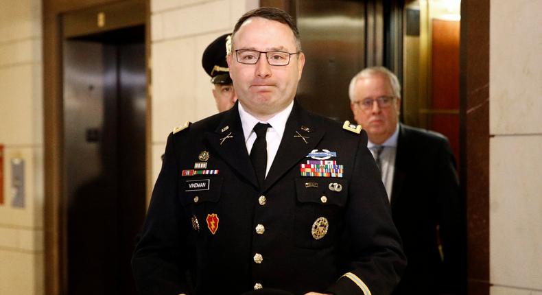 Army Lieutenant Colonel Alexander Vindman, a military officer at the National Security Council, center, arrives on Capitol Hill in Washington, Tuesday, Oct. 29, 2019, to appear before a House Committee on Foreign Affairs, Permanent Select Committee on Intelligence, and Committee on Oversight and Reform joint interview with the transcript to be part of the impeachment inquiry into President Donald Trump.(AP Photo/Patrick Semansky)