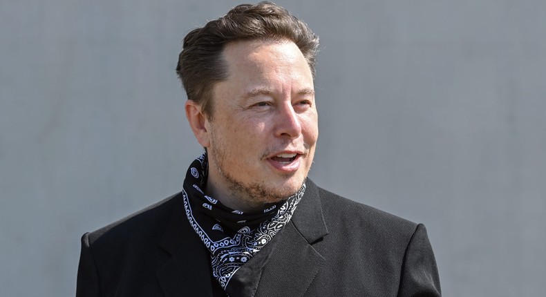 Elon Musk, Tesla CEO, stands at a press event on the grounds of the Tesla Gigafactory.