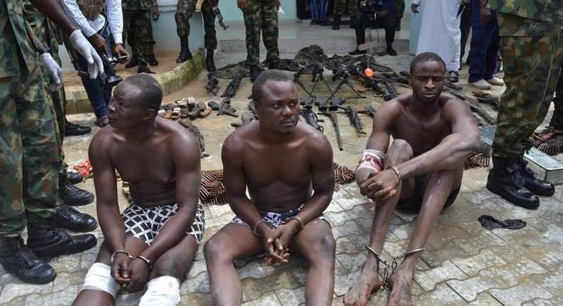 Suspected members of the Niger Delta Avengers are seen as they are paraded by the Nigeria military after their arrest in the Nembe waters, Rivers, Nigeria, August 22, 2016. Photo taken August 22, 2016 