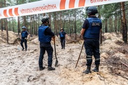 Ukraińska agencja: Do masowych grobów pod Iziumem trafiały ciała ofiar ostrzałów