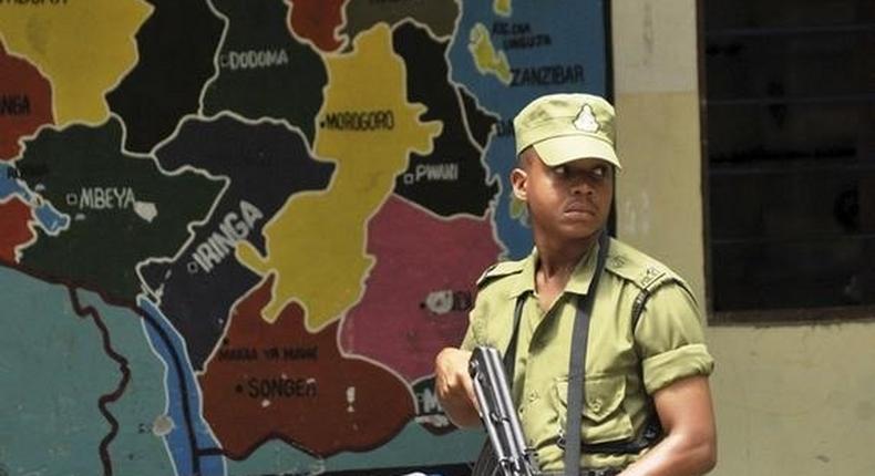 A Tanzanian policeman guards ballot boxes outside a counting centre following the presidential and parliamentary election in Dar es Salaam, October 28, 2015. REUTERS/Sadi Said