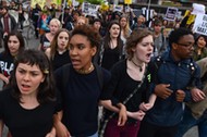 BALTIMORE, MD - MAY 1: Protesters lock arms during a Black Live