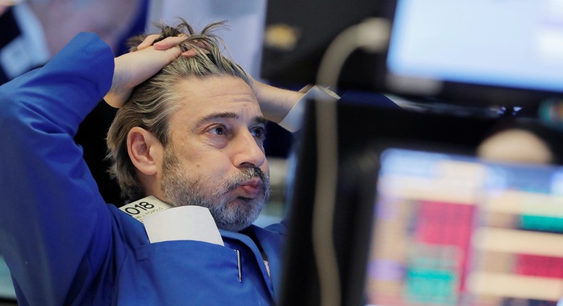 A trader works on the floor at the New York Stock Exchange (NYSE) in New York City, U.S., March 5, 2020.