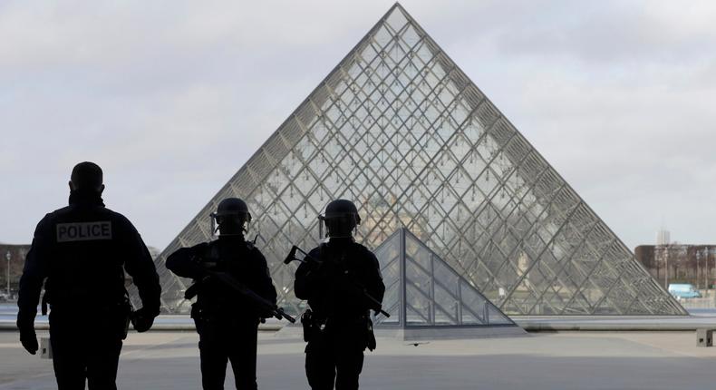 French police secure the site near the Louvre Pyramid in Paris, France, February 3, 2017 after a French soldier shot and wounded a man armed with a knife after he tried to enter the Louvre museum in central Paris carrying a suitcase, police sources said.