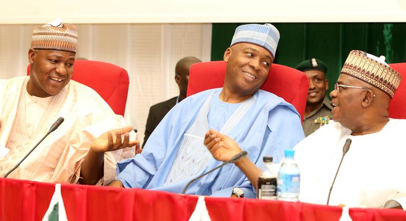 Chief Whip, Hon. Alhassan Ado Doguwa handing over the Plaque of The Sun Political Icon of the Year  to the Speaker, Rt. Hon. Yakubu Dogara.Chief Whip represented Speaker at the Award ceremony in Lagos last Saturday