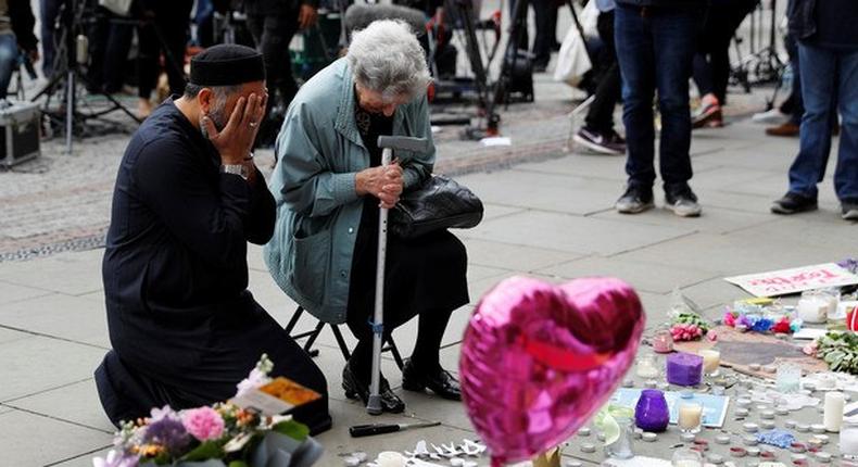 Two grieving people in Manchester 