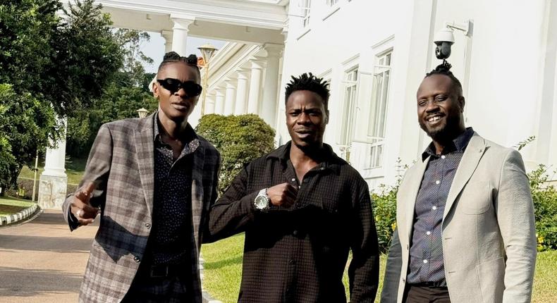 L-R Jose Chameleone, Alien Skin and Bebe Cool at State House Entebbe