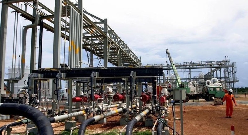 A Tanzanian engineer walks at the Songas gas processing plant in Songo Songo Island, 225 km south of the Tanzanian capital Dar es Salaam and 25 km off the coast of Tanzania, in a file photo. REUTERS/Emmanuel Kwitema