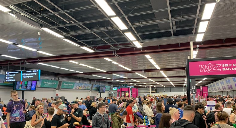 Long lines at Luton Airport, near London, on July 19, 2024, as airlines and other companies reeled from a mass IT outage involving Microsoft and Crowdstrike.Nick Xydias