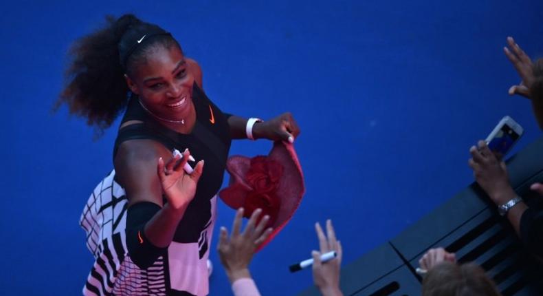 Serena Williams nearly scrawled with marker pen on an designer pink hat when she was handed it after her win over Johanna Konta